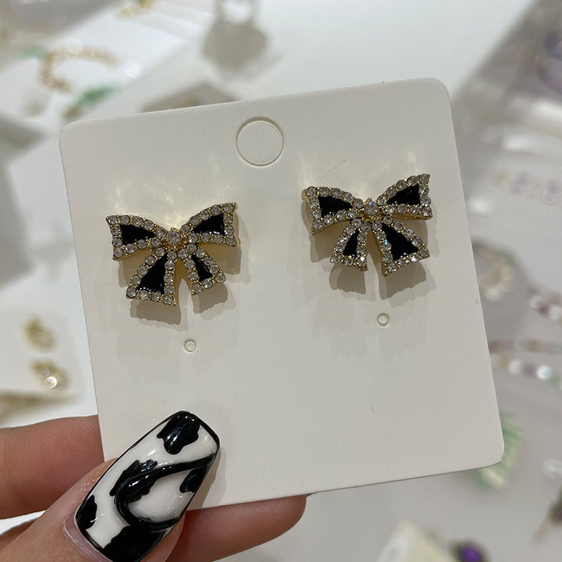 Wholesale Bow Oil Dripping Diamond Snowflake Earrings